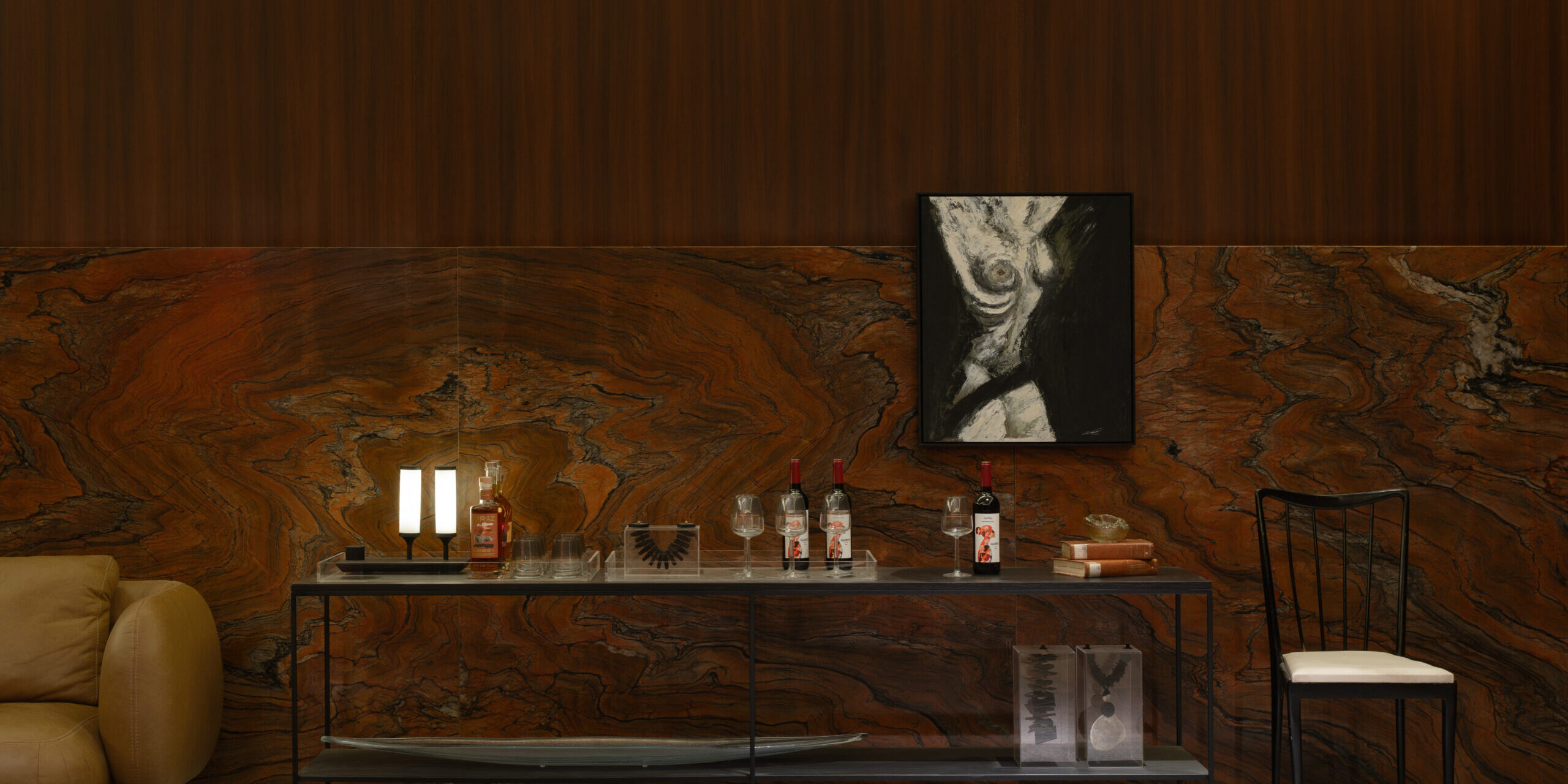 Living room accent wall showcasing the artistic movement of stone panels.