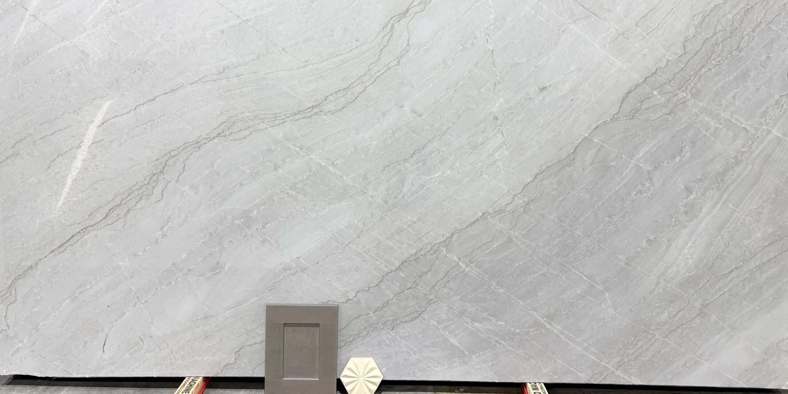 Azzurra Bay countertop paired with warm wood cabinetry to show color contrast.