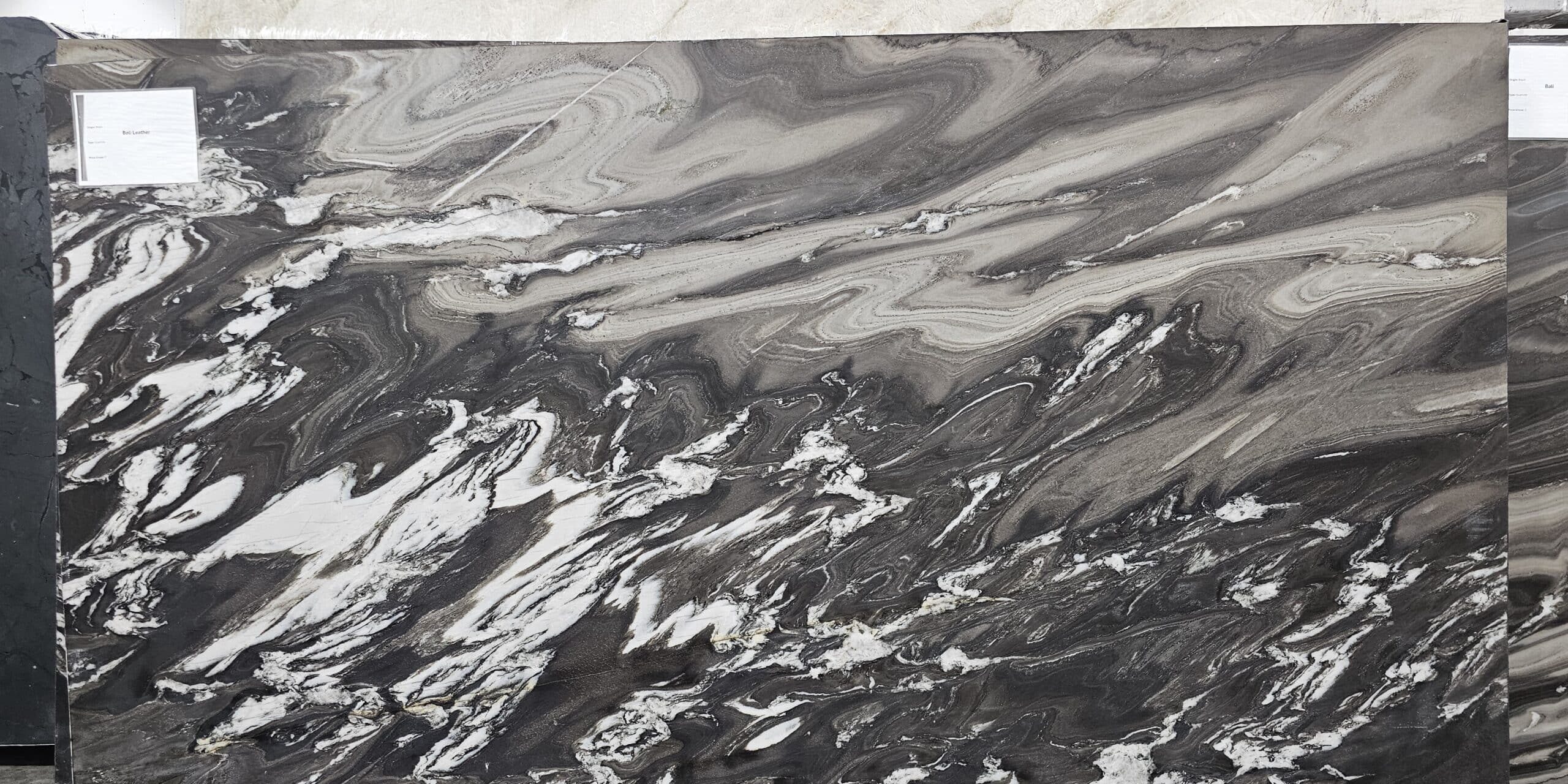 Full slab view of Bali Quartzite showing its massive, sweeping organic movement and high contrast.