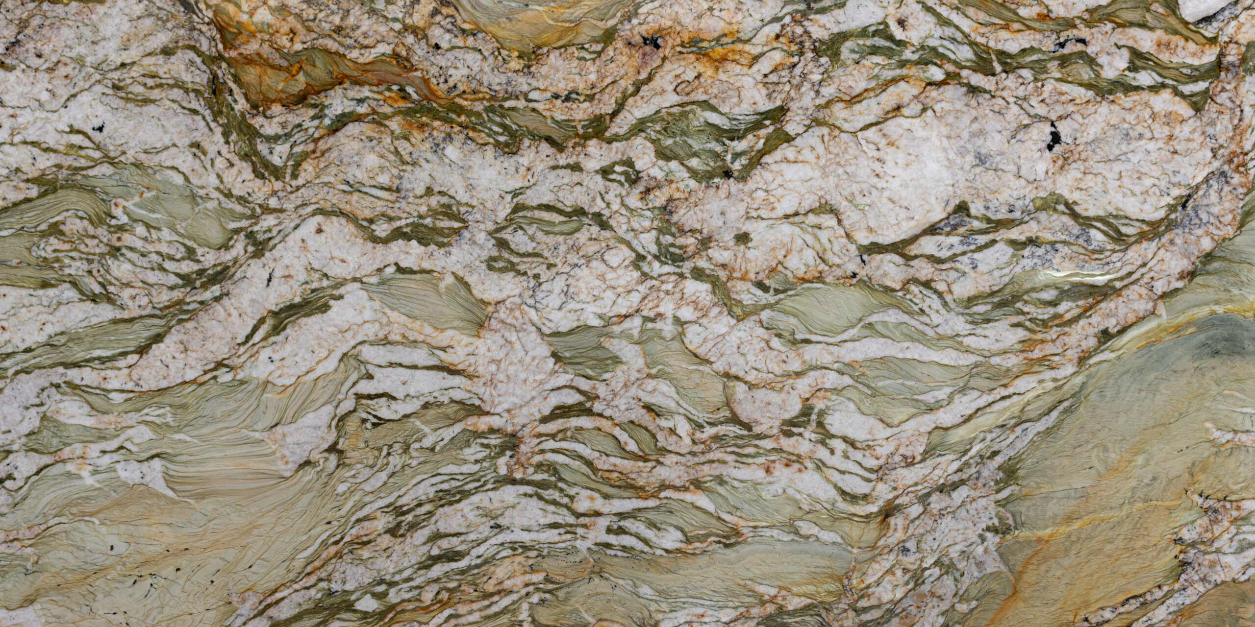 Large format natural stone slab with a mix of earthy tones and bold movement, ideal for countertops.