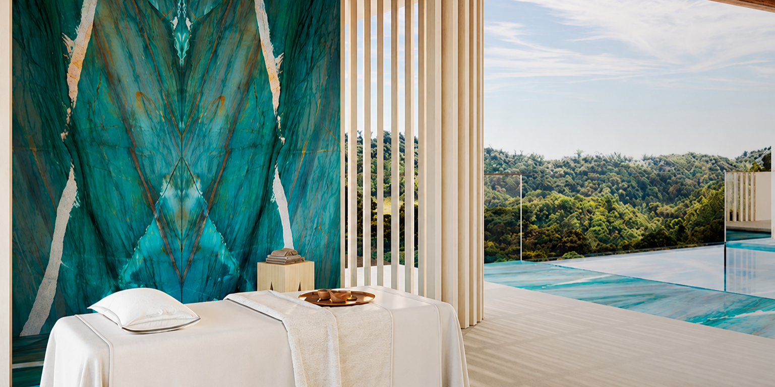 A luxury wellness center showcasing a floor-to-ceiling statement wall that highlights the natural translucency and colors of the stone.