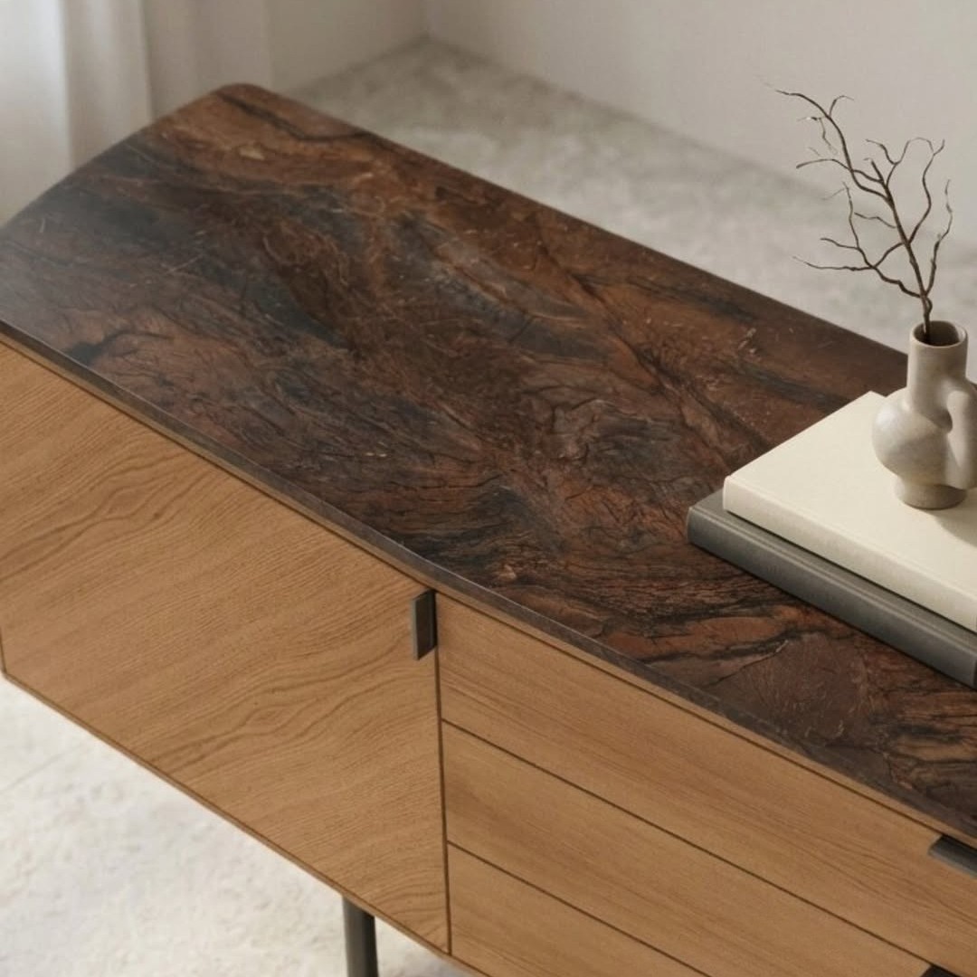 Elegant coffee table featuring a dark brown natural stone surface in a luxury living room.