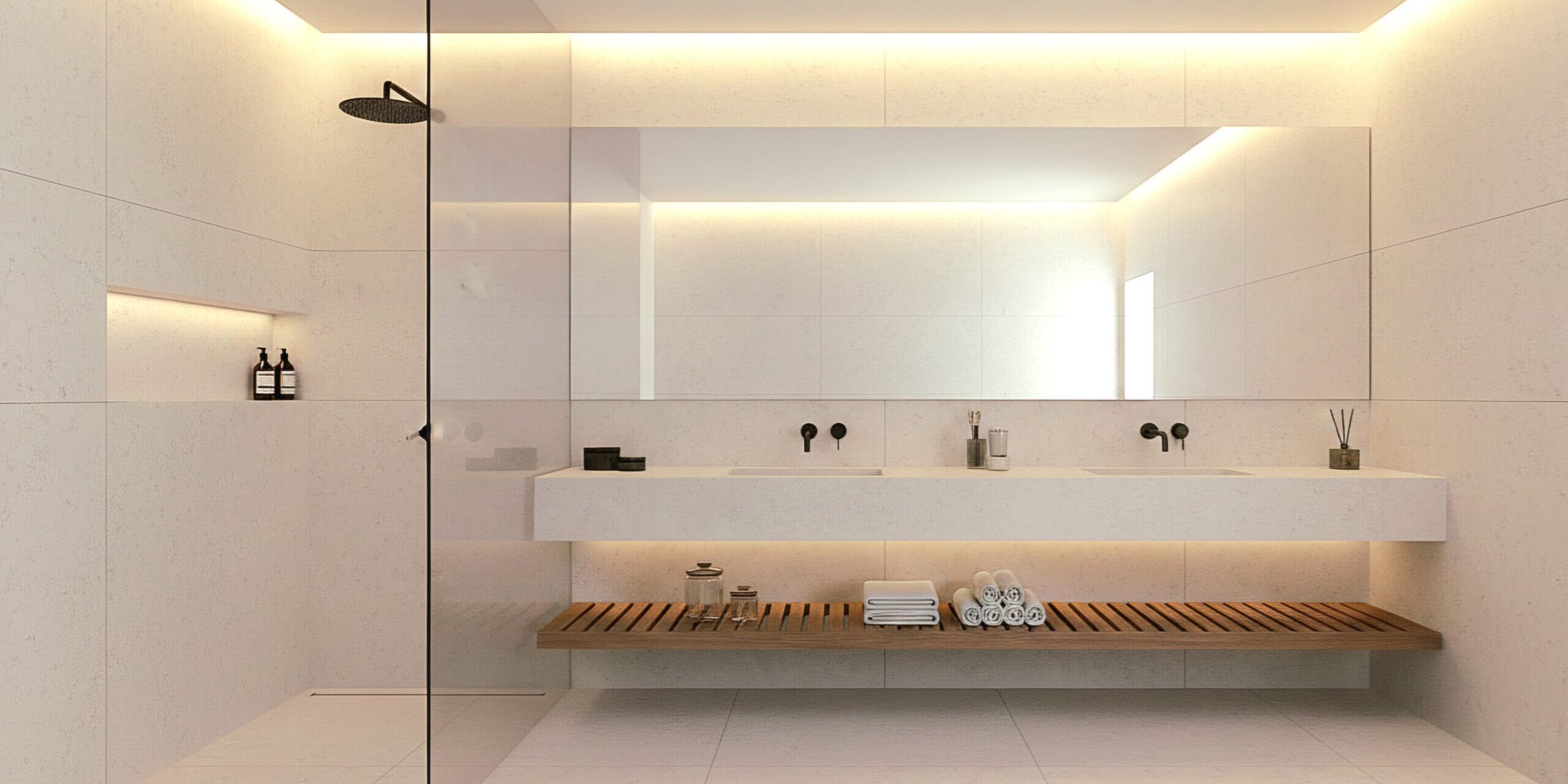 Bathroom vanity countertop in Carrara Gold Quartz, featuring refined gray veining and warm gold details that elevate the clean, modern design.