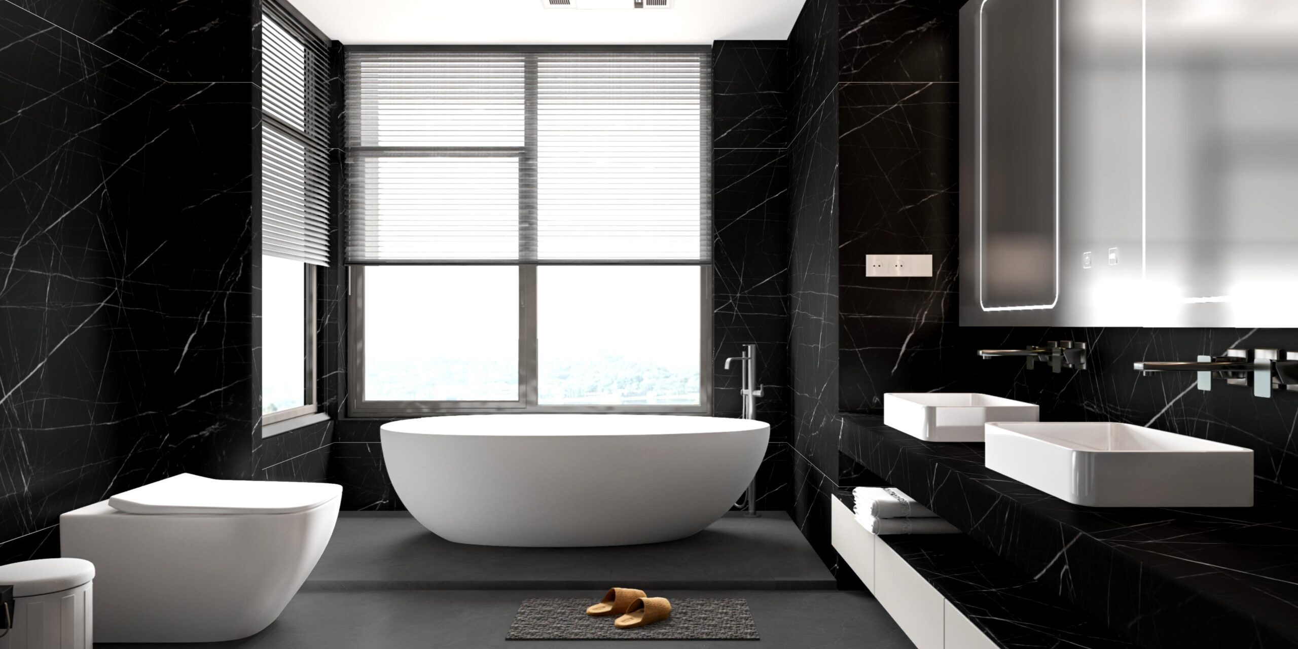 Monolithic black vanity top with a matching integrated sink made of Venom Quartzite.