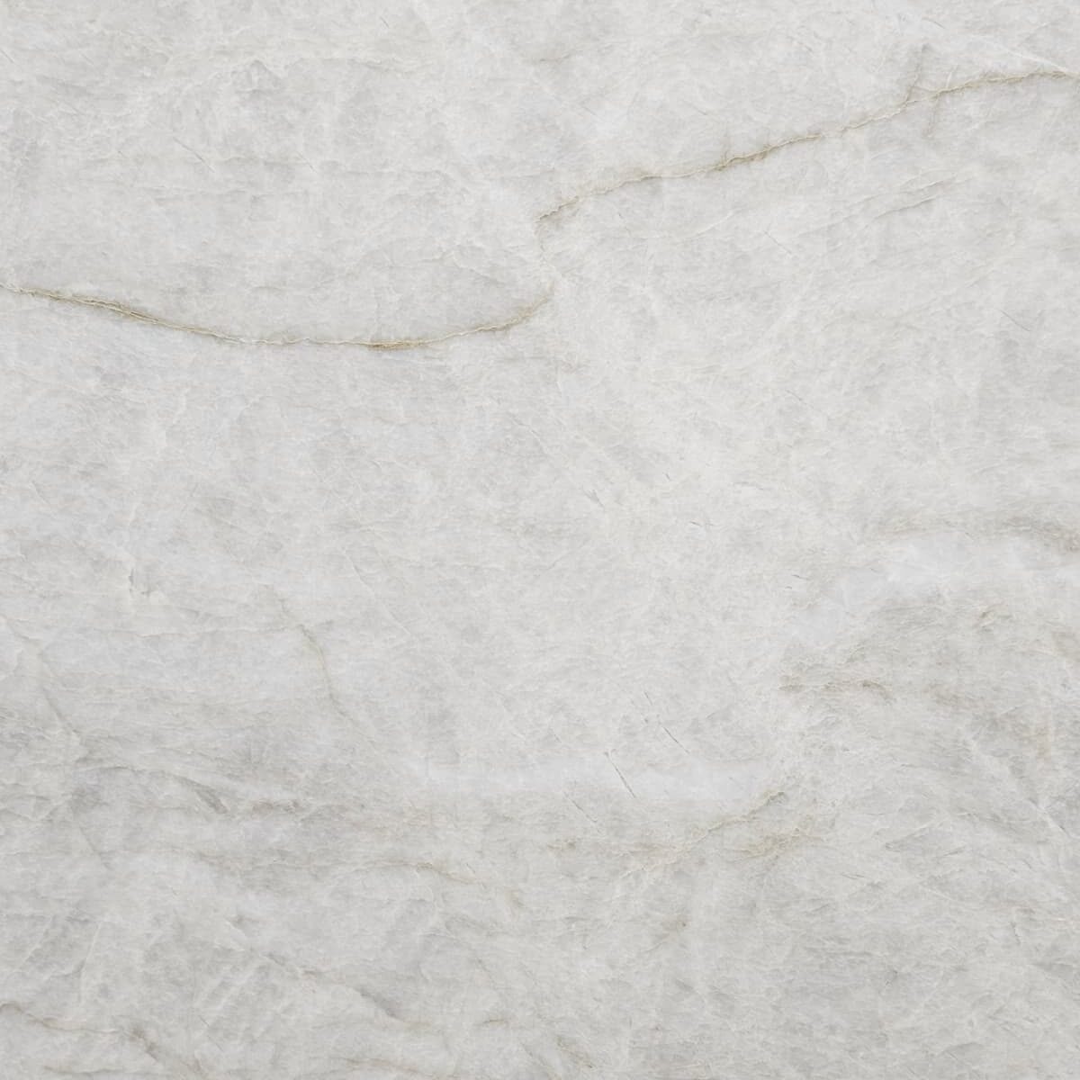 Close-up of the translucent mineral layers found in a premium ivory-toned slab.