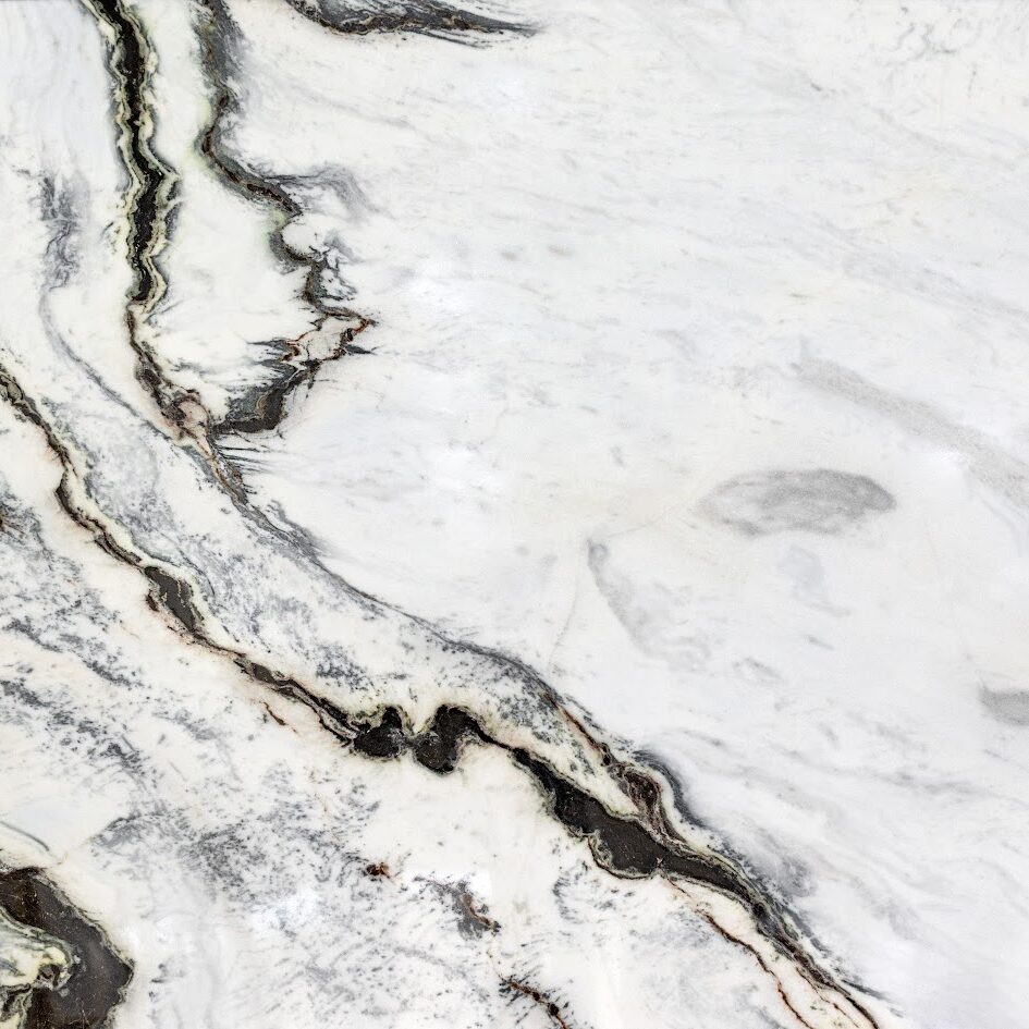Close-up detail of the intricate grey and black veining of a natural stone slab.